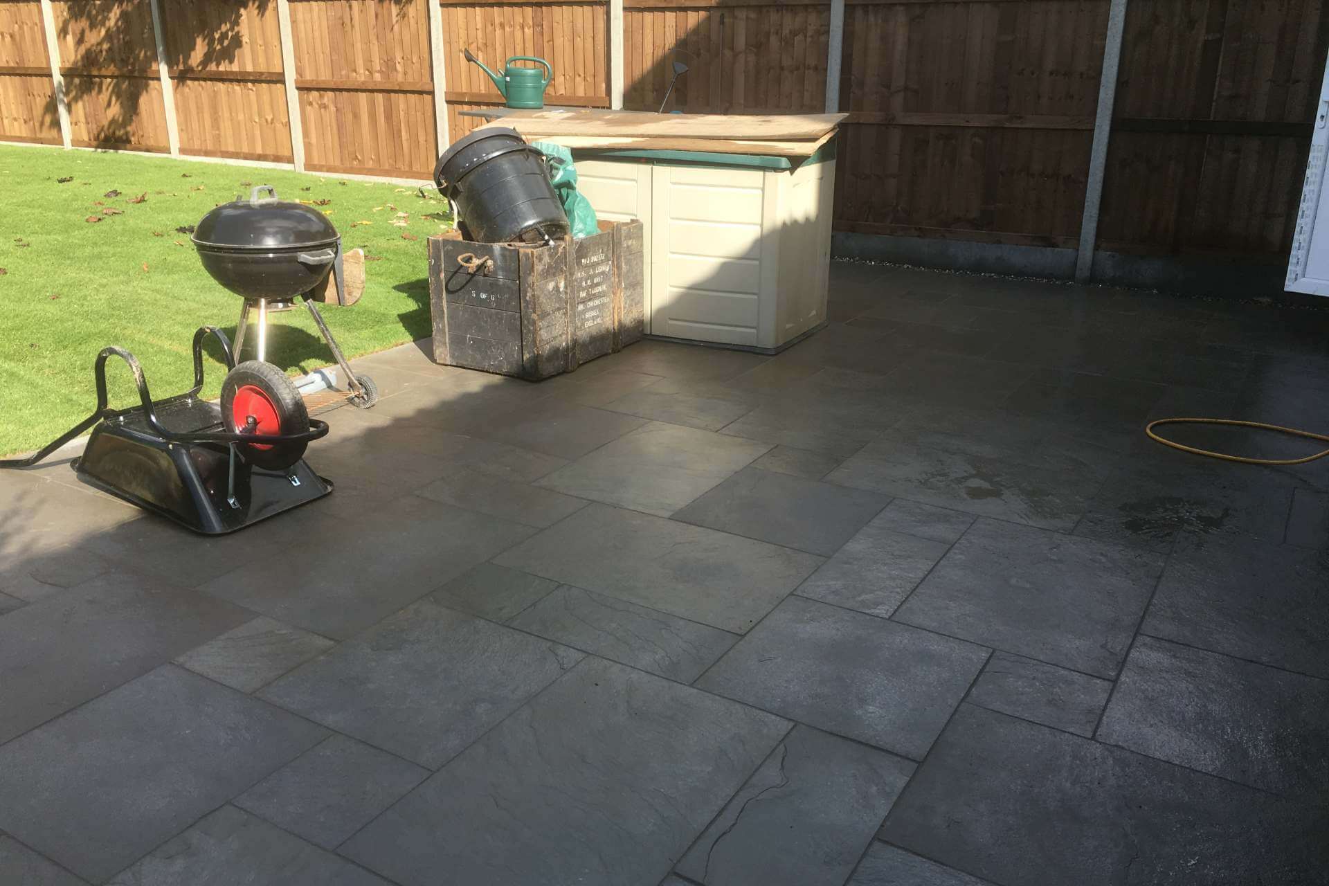 Dark slate patio in a Gloucester garden